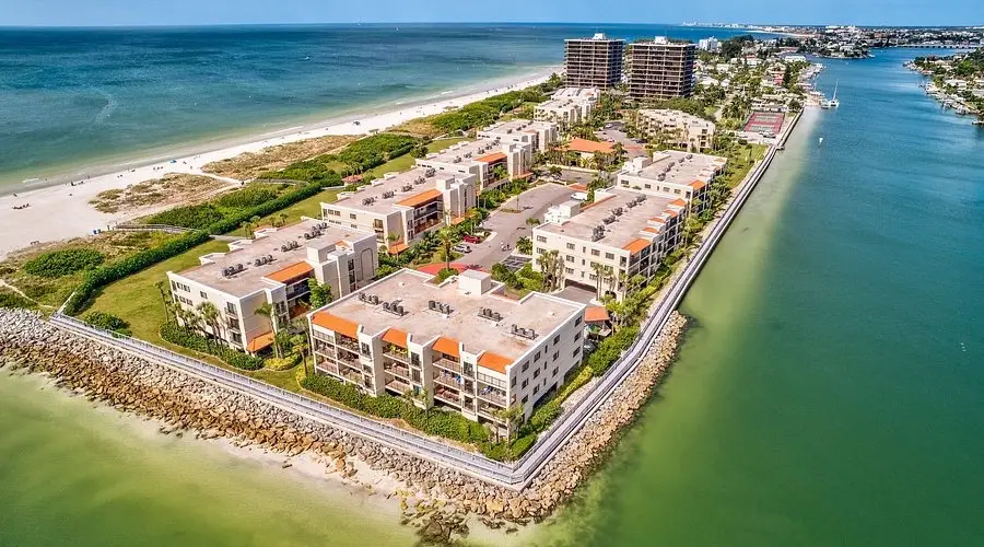 Waterfront condominium building representing what buyers should check before buying a condo in Dunedin, Florida